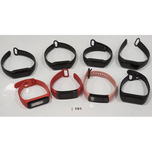 EIGHT FITNESS TRACKERS
including three Mi's and one Samsung SM-R220 (8)