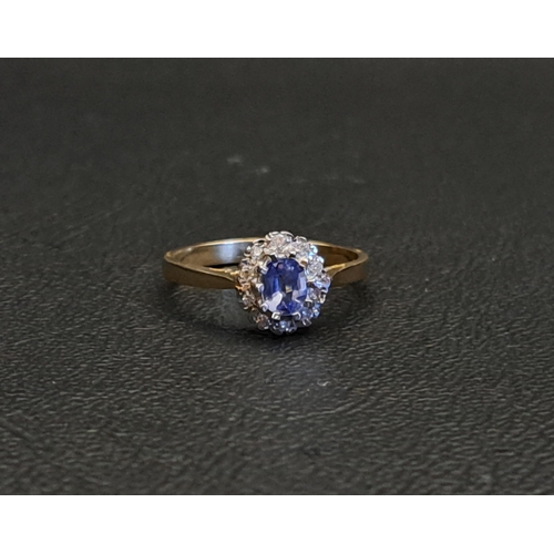 145 - BLUE SAPPHIRE AND DIAMOND CLUSTER RING
the central oval cut sapphire approximately 0.3cts in ten dia... 