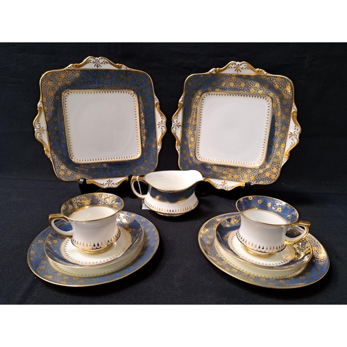 167 - PARAGON TEA SET
decorated with a white ground with a blue border with gilt floral highlights, compri... 