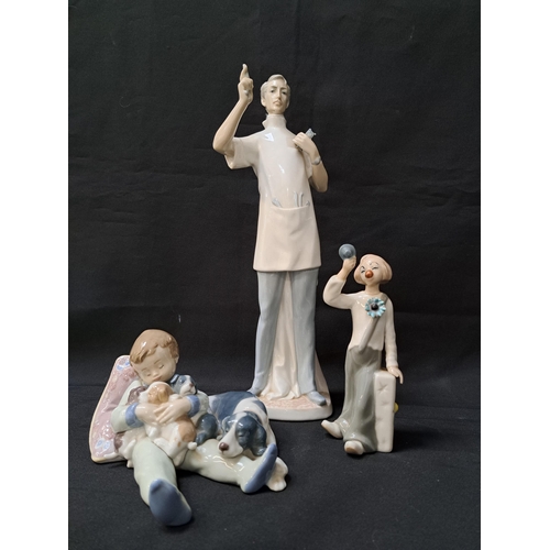 169 - LLADRO PORCELAIN FIGURINE
the dentist, 4762, 35cm high, Lladro figurine sweet dreams, 1535, 18cm lon... 