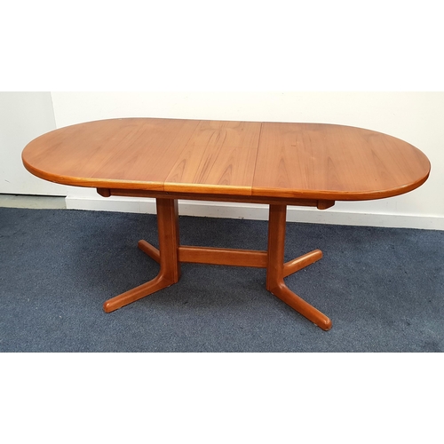 466 - MID CENTURY TEAK D END DINING TABLE
with a pull apart top revealing a fold out leaf, standing on sha... 