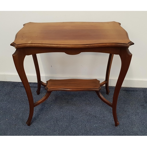 471 - EDWARDIAN MAHOGANY OCCASIONAL TABLE
with a shaped rectangular top on shaped supports, united by an u... 