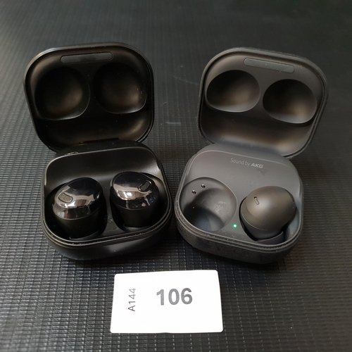 106 - PAIR OF SAMSUNG EARBUDS
in charging case, model SM-R190; together with a single Samsung earbud in ch... 