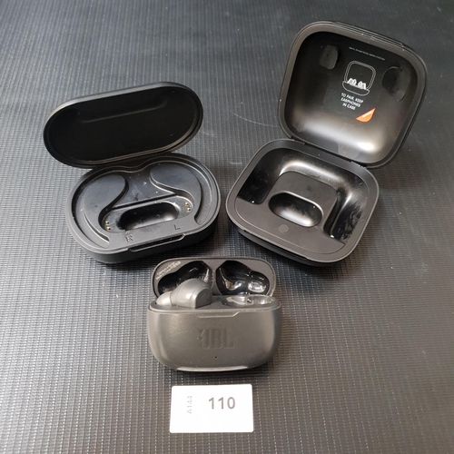 THREE EARBUD CHARGING CASES
comprising Beats, JLab and JBL (the JBL with a single earbud)