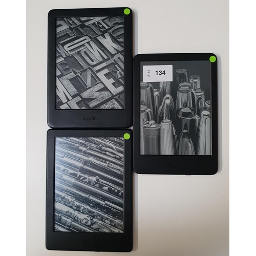 THREE AMAZON KINDLE E-READERS 
comprising a Basic 4, serial number G092 AP05 3382 0367; a Basic 3, serial number G090 VB05 9526 01BM; and a Basic 2, serial number G000 K905 6562 0E55 (3)
Note: It is the buyer's responsibility to make all necessary checks prior to bidding to establish if the device is blacklisted/ blocked/ reported lost. Any checks made by Mulberry Bank Auctions will be detailed in the description. Please Note - No refunds will be given if a unit is sold and is subsequently discovered to be blacklisted or blocked etc.