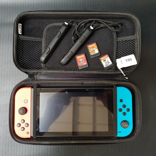 NINTENDO SWITCH
S/N XAJ70023498214; together with three games - Super Mario Bros. Wonder, Super Mario Odyssey and The Legend of Zelda Breath of the Wild; and a pair of Joy-Con straps, in case