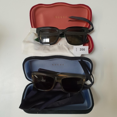 TWO PAIRS OF GUCCI SUNGLASSES
both with cases