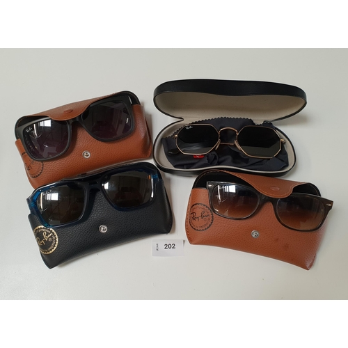FOUR PAIRS OF RAY-BAN SUNGLASSES
all with cases