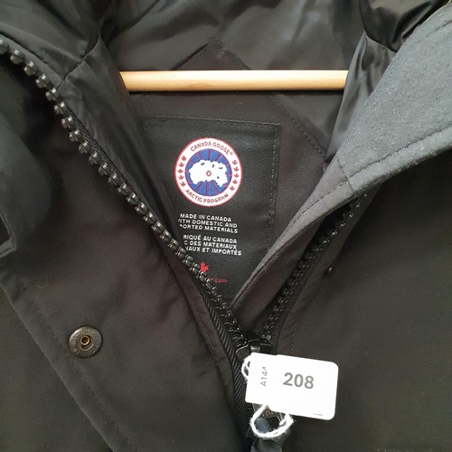 208 - LADIES CANADA GOOSE BLACK SHELBURNE PARKA
size M, style 3802L
Note: with white paint on sleeve