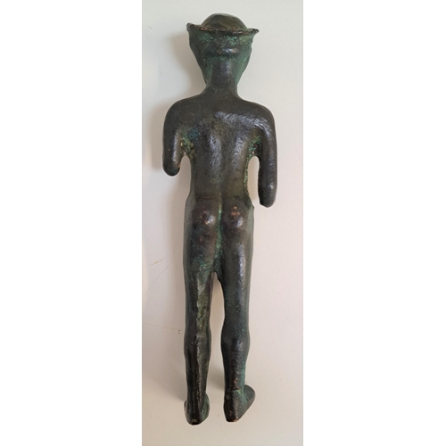 274 - BRONZE KOUROS STATUETTE 
C.550-525 B.C, wearing a double crown with the remnants of the arms at the ... 