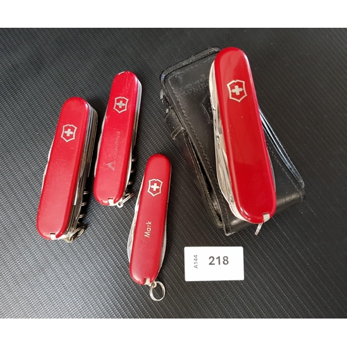 FOUR VICTORINOX SWISS ARMY KNIVES
of various sizes and designs, one with case
Note: You must be over the age of 18 to bid on this lot.