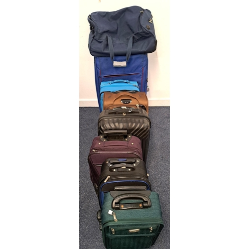 64 - SELECTION OF SEVEN SUITCASES AND ONE HOLDALL
including Giannetto, Dunlop, Travel Vision and Kipling
... 