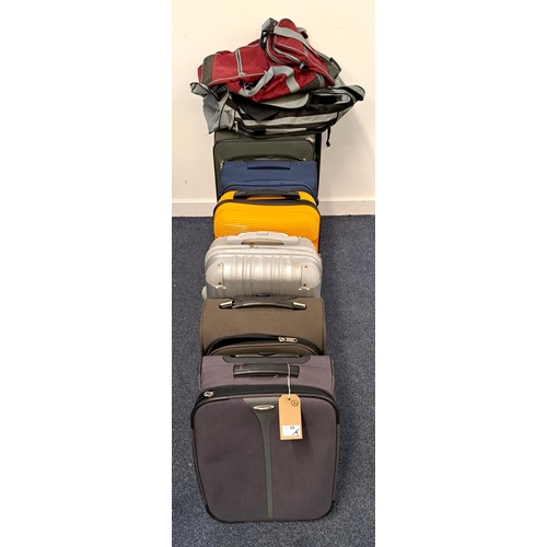 66 - SELECTION OF SEVEN SUITCASES AND TWO RUCKSACKS
including Dunlop, Shilton, Albatros and Agrado
Note: ... 