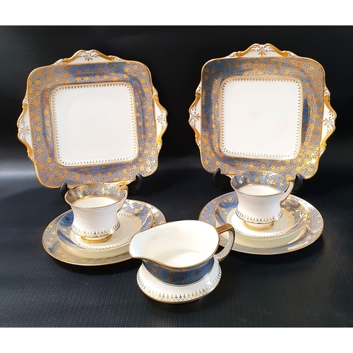 167 - PARAGON TEA SET
decorated with a white ground with a blue border with gilt floral highlights, compri... 