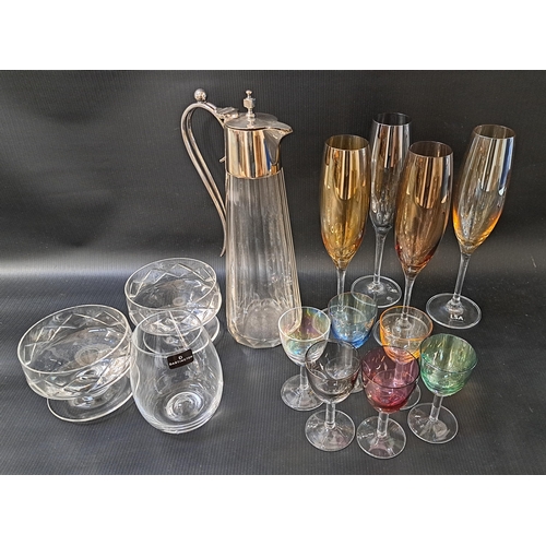 180 - MIXED LOT OF GLASSWARE
comprising a Mappin and Webb conical claret jug with silver plated mounts, wa... 