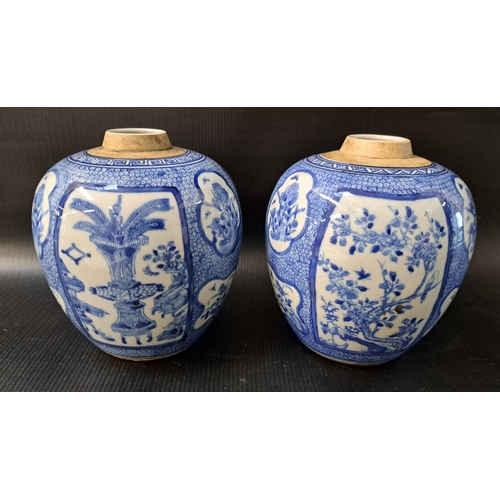 188 - PAIR OF CHINESE BLUE AND WHITE GINGER JARS
decorated with panels of flowers, both lacking lids, 15cm... 