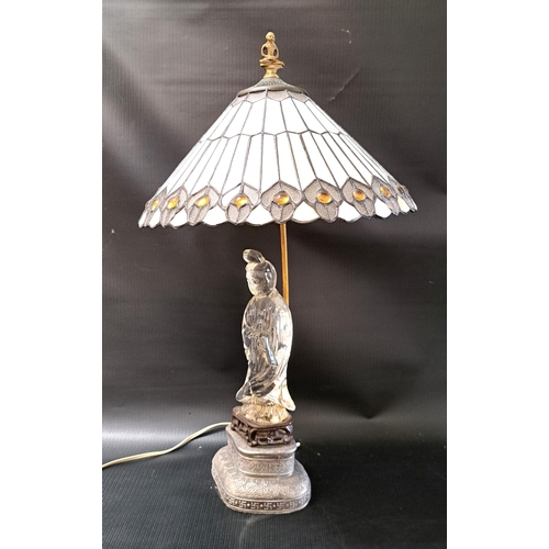 256 - FIGURAL GLASS LAMP
of Quan Yin on a pierced hardwood stand and shaped metal base, with later lamp co... 