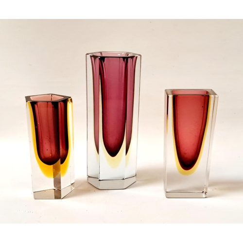 209 - THREE MURANO SOMMERSO VASES
in cranberry with yellow, various shapes - rectangular, pentagonal and h... 