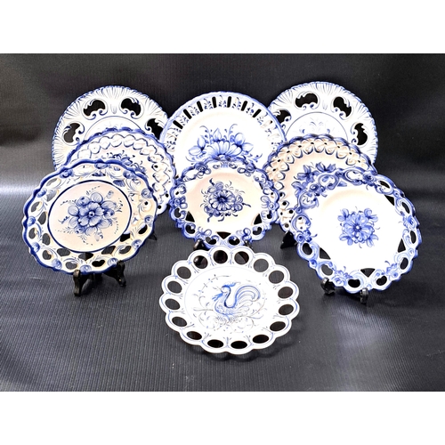 212 - SIXTEEN PORTUGUESE BLUE AND WHITE PLATES
of varying size, all with floral decoration and pierced rim... 