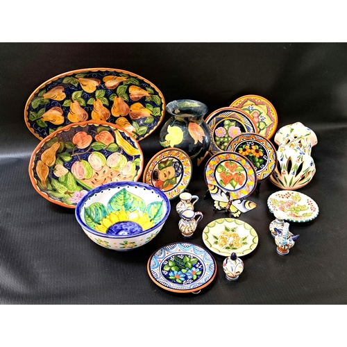 214 - LARGE SELECTION OF COLOURFULLY DECORATED PORTUGUESE CERAMICS
all with floral and fruit decoration, i... 