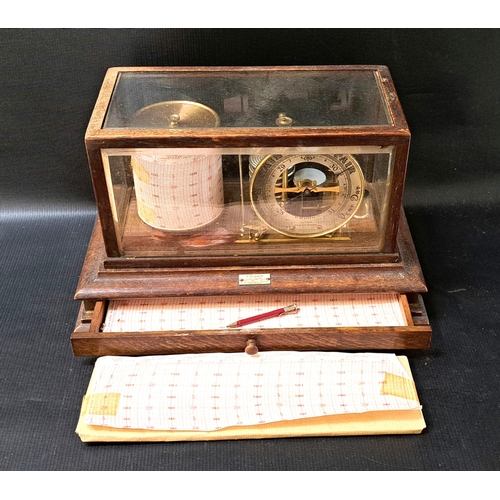 295 - EARLY 20th CENTURY OAK AND GLASS CASED BAROGRAPH
by J Lizars, Edinburgh, with drawer to base and sil... 