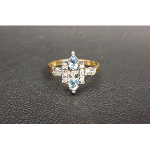 64 - UNUSUAL BLUE TOPAZ AND DIAMOND RING
the two oval cut blue topaz gemstones approximately 0.15cts each... 