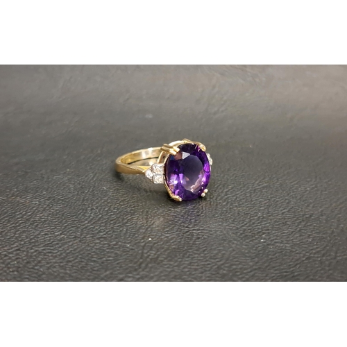 90 - AMETHYST AND DIAMOND DRESS RING
the central oval cut amethyst measuring 11.8mm x 9.6mm x 6.1mm, flan... 