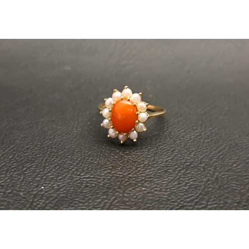 110 - CORAL AND SEED PEARL CLUSTER RING
the central oval cabochon coral in twelve pearl surround, on nine ... 