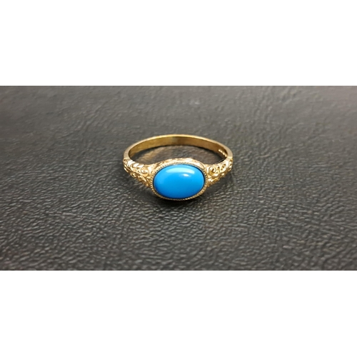 121 - TURQUOISE SINGLE STONE RING
the oval cabochon turquoise flanked by scroll decorated shoulders, on ni... 