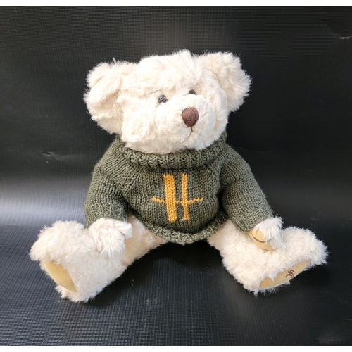 355 - HARRODS TEDDY BEAR
with green jumper and white fur, 31cm high