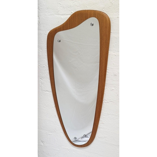 MID CENTURY TEAK WALL MIRROR
of irregular form, 79cm x 36cm