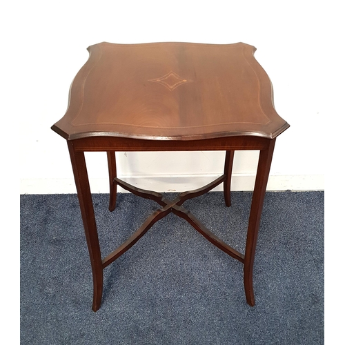 528 - EDWARDIAN INLAID MAHOGANY WINDOW TABLE
the shaped top raised on outswept supports with X stretcher, ... 