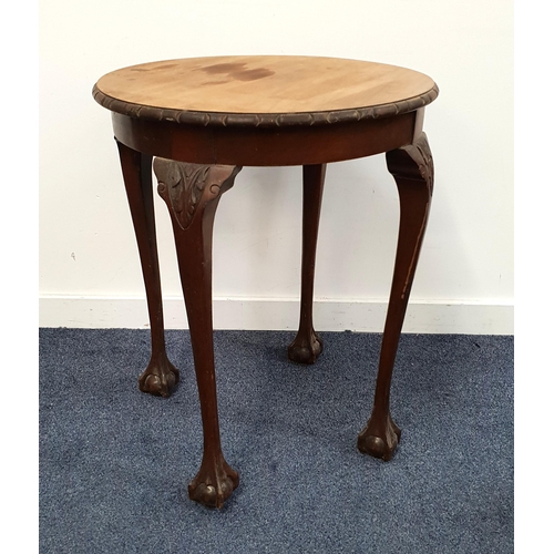 502 - MAHOGANY CIRCULAR OCCASIONAL TABLE 
with claw and ball feet, 74cm x 59cm x 59cm