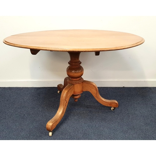 508 - VICTORIAN OVAL MAHOGANY BREAKFAST TABLE
with tilt top and raised on pedestal support with three outs... 