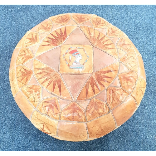 521 - VINTAGE LEATHER POUFFE
the patchwork stool with central Egyptian head detail and further tooled deco... 