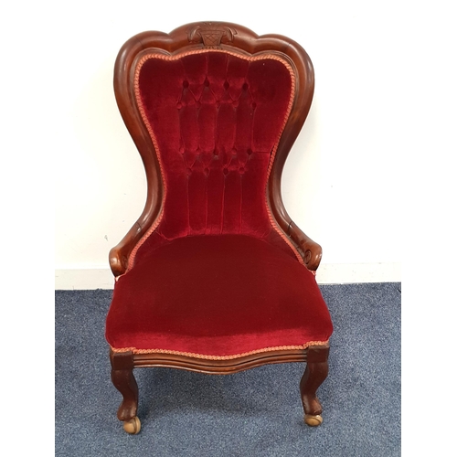 551 - EARLY 20th CENTURY NURSING CHAIR
with deep red velvet upholstery with button back detail