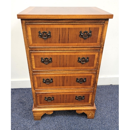 484 - YEW AND CROSSBANDED CHEST OF DRAWERS
with four cockbeaded drawers, standing on bracket feet, 73.5cm ... 