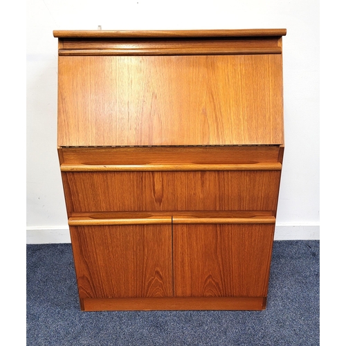 497 - MORRIS OF GLASGOW TEAK BUREAU
with a fall flap opening to reveal a fitted interior above a long draw... 