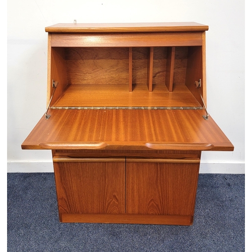 497 - MORRIS OF GLASGOW TEAK BUREAU
with a fall flap opening to reveal a fitted interior above a long draw... 