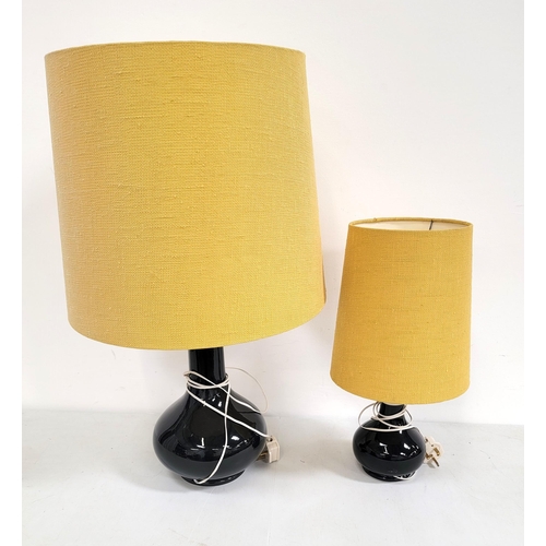 512 - TWO BLACK CERAMIC LAMPBASES
the tallest 43cm, with yellow shades (2)