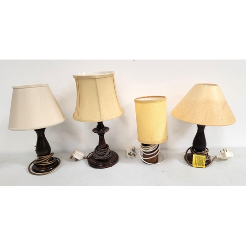 516 - FOUR VARIOUS WOODEN TABLE LAMP BASES, 
including a mid century teak example, the tallest 28cm high (... 