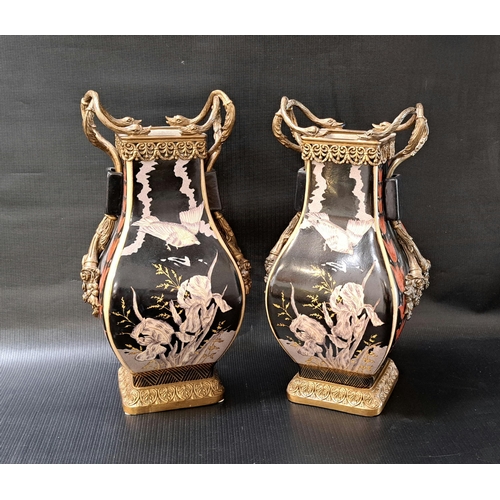 225 - PAIR OF CONTEMPORARY WONG LEE VASES
with metal handles in the form of swans and on metal square base... 