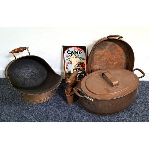 507 - FIVE METALWARE ITEMS
comprising a brass coal scuttle, a two handled copper pot stamped 15 to the sid... 