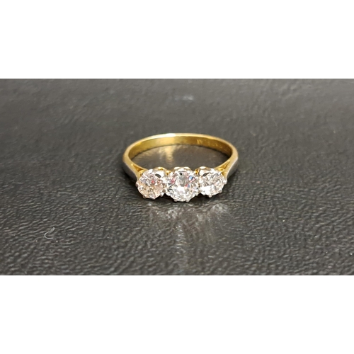 59 - GRADUATED DIAMOND THREE STONE RING
the central diamond approximately 0.3cts, flanked by diamonds mea... 