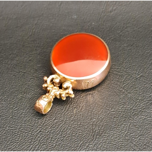 70 - LARGE CARNELIAN AND AGATE SET FOB
in nine carat gold mount, 4.5cm long and total weight approximatel... 