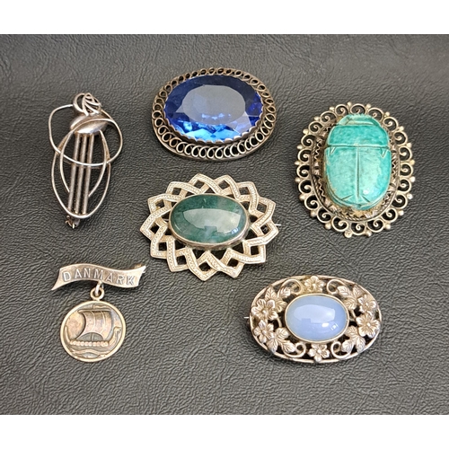 75 - FIVE SILVER BROOCHES
comprising examples set with moss agate, faceted blue glass and opaque agate st... 