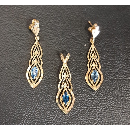 95 - SUITE OF BLUE TOPAZ SET JEWELLERY 
comprising a pair of drop earrings and a pendant, all of pierced ... 