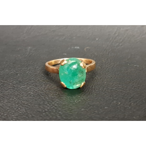 101 - CABOCHON EMERALD SINGLE STONE RING
the emerald measuring approximately 11mm x 9.3mm, on unmarked gol... 