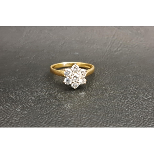 109 - DIAMOND CLUSTER RING
the seven diamonds totalling approximately 0.75cts, on eighteen carat gold shan... 