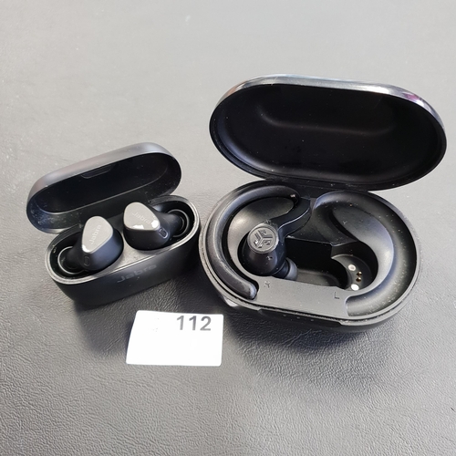 112 - PAIR OF JABRA EARBUDS IN CHARGING CASE
and a single Jlab earbud in charging case